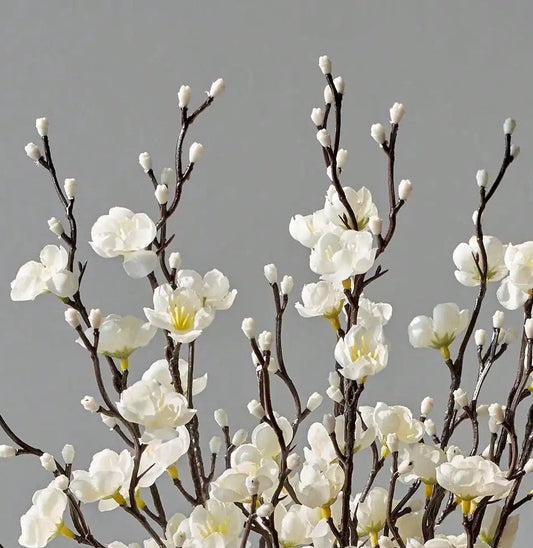 fleurs blanches en plastique à longue tige